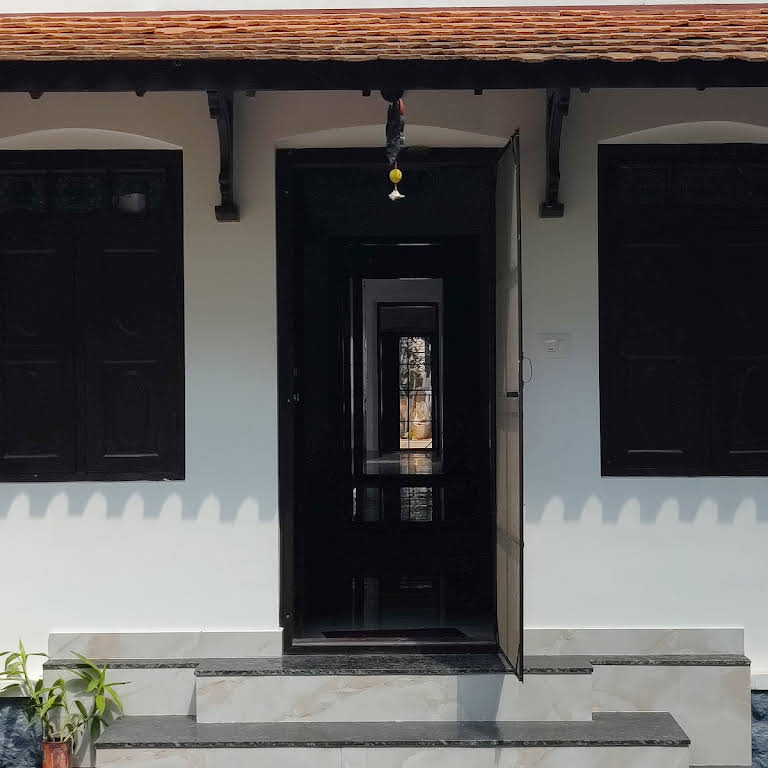 Veranda with carved pillars